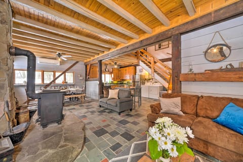 Living Room | Wood-Burning Stove | Wall A/C Unit