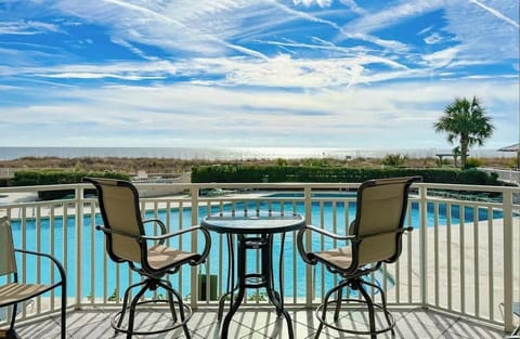 Balcony Overlooking Pool with Ocean View