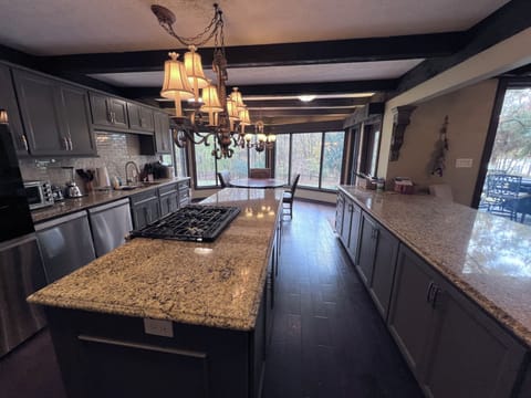Kitchen fully stocked with cooking pans, utensils, serveware and other goodies!