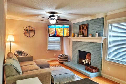 Enjoy this cozy family room with Roku TV