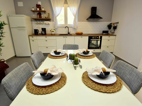 Table, Furniture, Property, Tableware, Dishware, Chair, Lighting, Wood, Interior Design