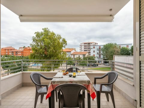 Table, Cloud, Sky, Furniture, Property, Chair, Building, Plant, Window, Shade