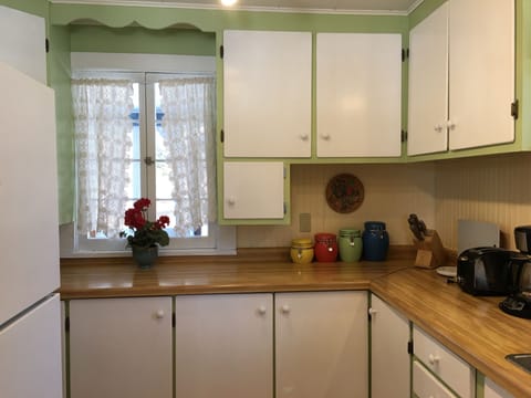 The kitchen. There's also a full stove/oven combination and a microwave.