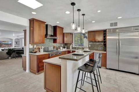 Modern kitchen with granite countertops and stainless steel appliances