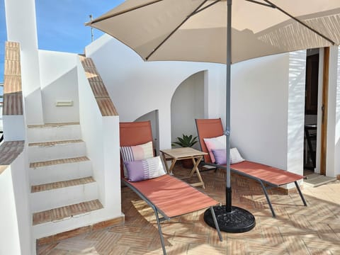 Terrace with sunbeds