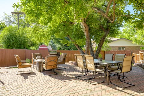 Outdoor patio with tons of outdoor seating, firepit and Grill. 