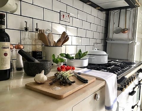 Reclaimed marble worktops, gas range cooker