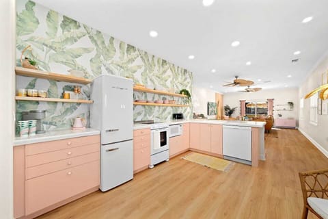 Cook meals or just order takeout and make cocktails in your full kitchen styled to suite the retro Cali theme.  Featuring a fully stocked Coffee bar, breakfast nook and serving bar.