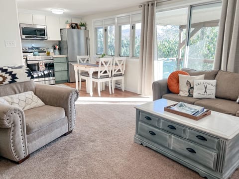 This accommodating living area boasts seating for 5 & a queen size sleeper sofa