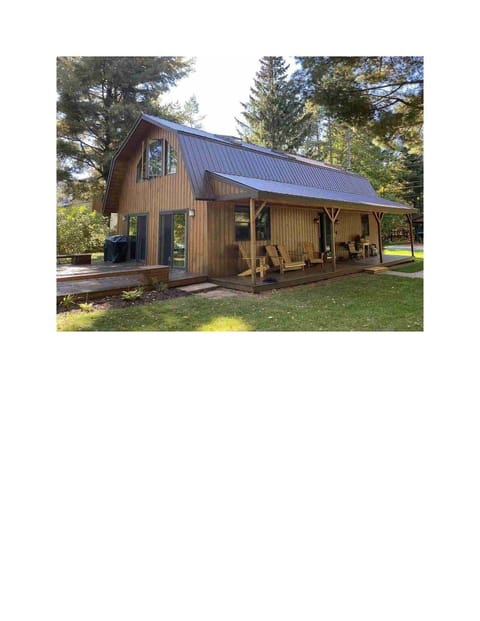 Front & side of house. Side faces water