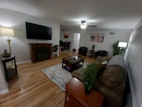 Nicely Furnished Living Room with new queen sleeper sofa.
