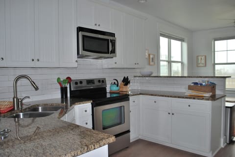 Full size appliances and plenty of counter space.