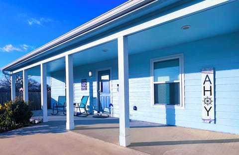 Front Exterior with porch and seating