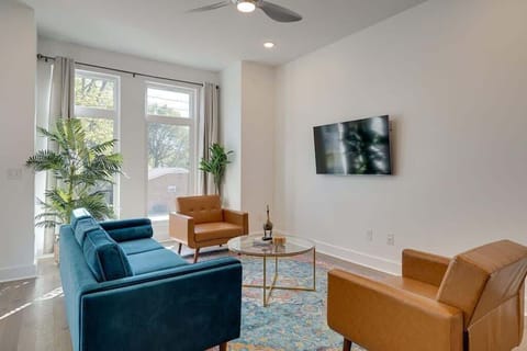 Chic modern living room with cozy furnitures and a smart TV!