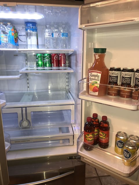 Stocked fridge with plenty of cold beverages 