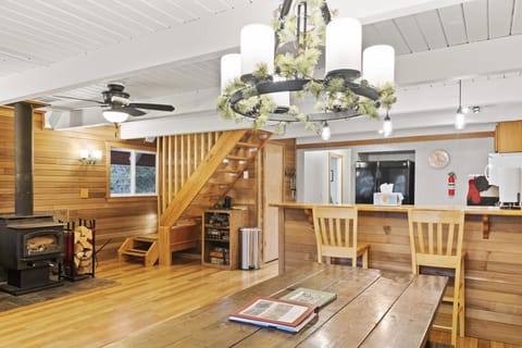 Loving the exposed beams and cabin vibes of our main living area
