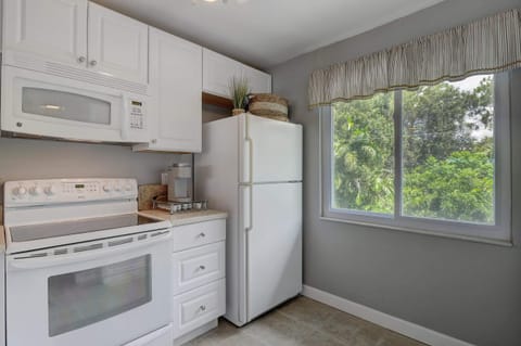 The Kitchen Has a Large Window Letting in Lots of Natural Light