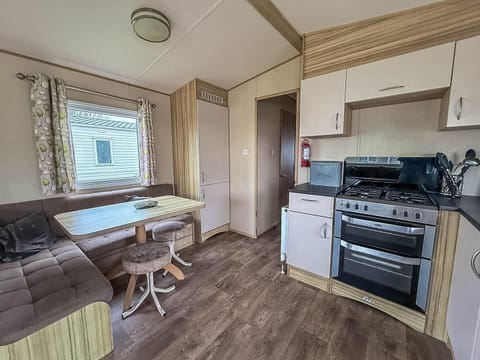 Cozy kitchen and dining nook with ample natural light