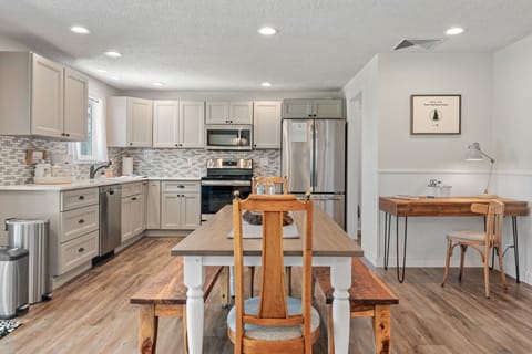 Family meals or time with friends can be spent around the farmstyle table.