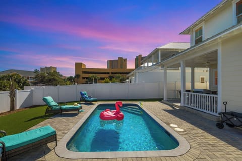 Welcome to " Footprints in the Sand" Beach House: this 4 bedroom, 3.5 bath house on the west end of Panama City Beach offers a 5 min walk to the beach, private pool and game room. The perfect place for your next vacation.