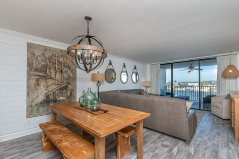 Large living and dining space with bayside views.