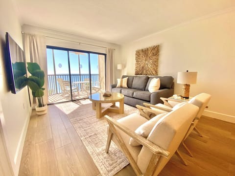 Relax in the living room with gorgeous Gulf views and comfortable furnishings