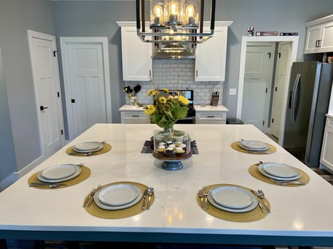 Place seating for six shown but stools and diner ware service eight.