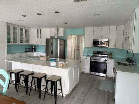 Huge center island with electricity, lots of work space