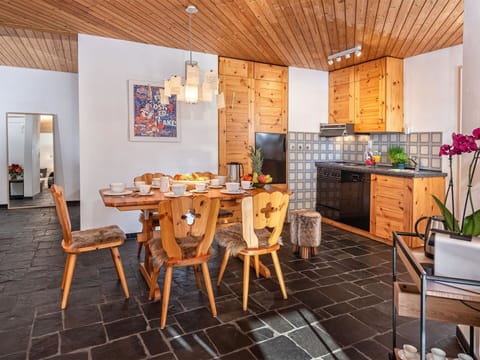 Table, Furniture, Property, Plant, Chair, Wood, Lighting, Countertop, Cabinetry, Flooring