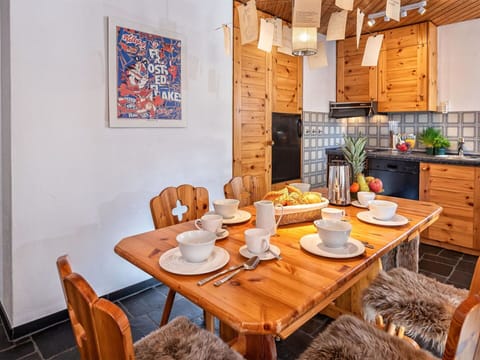 Table, Furniture, Property, Tableware, Building, Chair, Wood, Cabinetry, Orange, Lighting