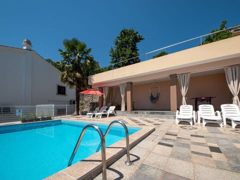 Water, Sky, Building, Swimming Pool, Azure, Chair, Shade, Plant, Outdoor Furniture, Tree