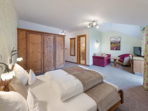 AlpenSchlössl family room - Hotel AlpenSchlössl Apartment in Salzburgerland