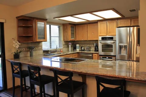 Kitchen w modern amenities for family gatherings
"Yosemite Riverside Retreat"