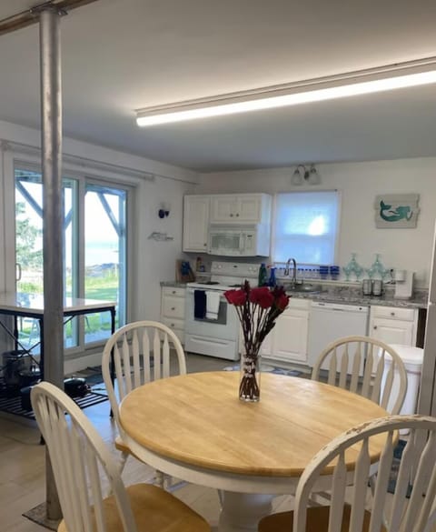 View of first floor living area toward 1st floor kitchen. 