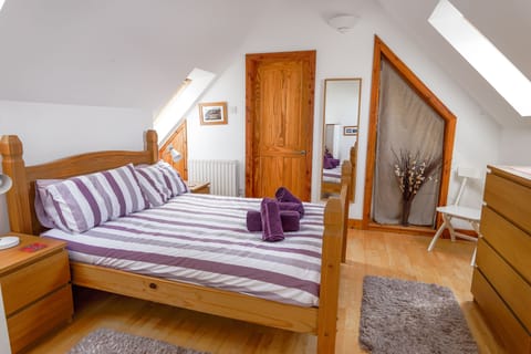 Bedroom and door to W/C.