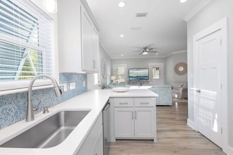 Kitchen - The spacious open kitchen features stainless appliances and is fully stocked with plenty of cookware and utensils for preparing meals during your stay.