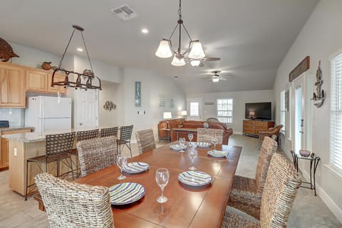 Dining and Additional bar seating - Share meals and laughter in the stylish dining area, enhanced by the coastal ambiance.