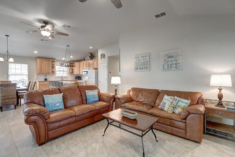 Open living room - Soft, comfortable seating, and ocean-inspired details create a welcoming space perfect for unwinding after a day by on the coast
