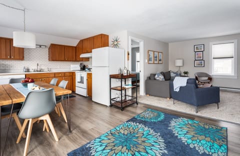 Walk in from the deck to a beautiful newly renovated open living/kitchen space.