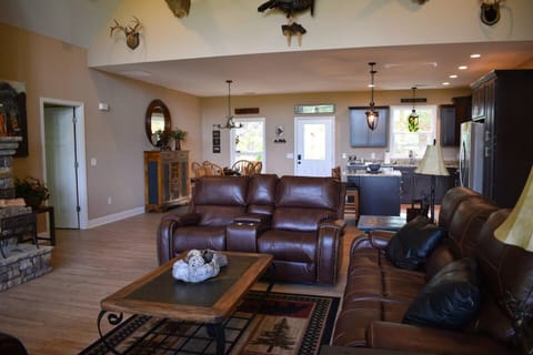 The great room features a spacious and open floor plan, providing ample room for relaxation and entertainment.