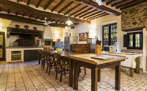 Fireplace with an oven for bread and pizza. 
Private villa chef on request 
Tuscany 
Luxury Villa