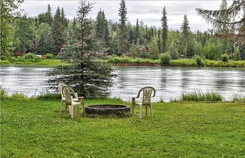 Camp fire ring next to Kenai River