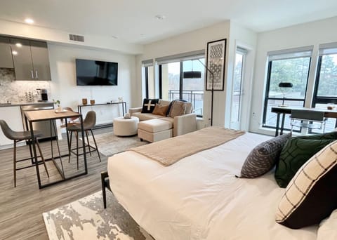 King Bed outfitted with luxury bedding atop a supportive hybrid mattress 