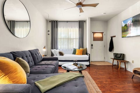 Our cozy Bali-inspired living room with multiple options for seating while you relax and enjoy streaming on our smart TV.