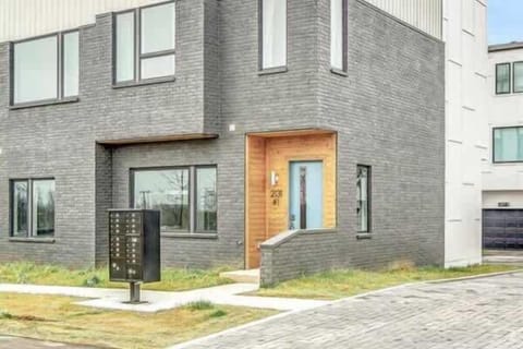 Character-filled brown door welcomes you to the property.