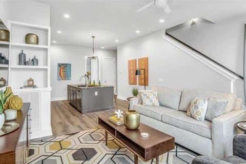 Sun-filled space where the kitchen and living room flow together.