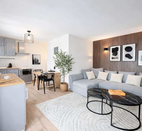 Comfortable living room with open kitchen
