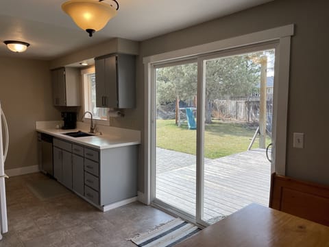 View of backyard from kitchen nook