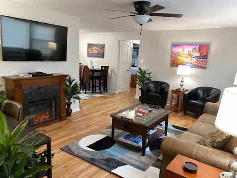 Nicely Furnished Living Room with new queen sleeper sofa.