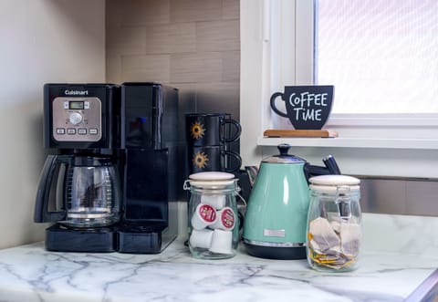 Drip & single cup coffee maker, grinder, tea & kettle.  We have it all!